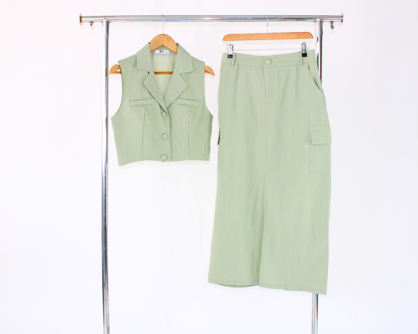 J17029 Conjunto Falda Chaleco botón aforrado