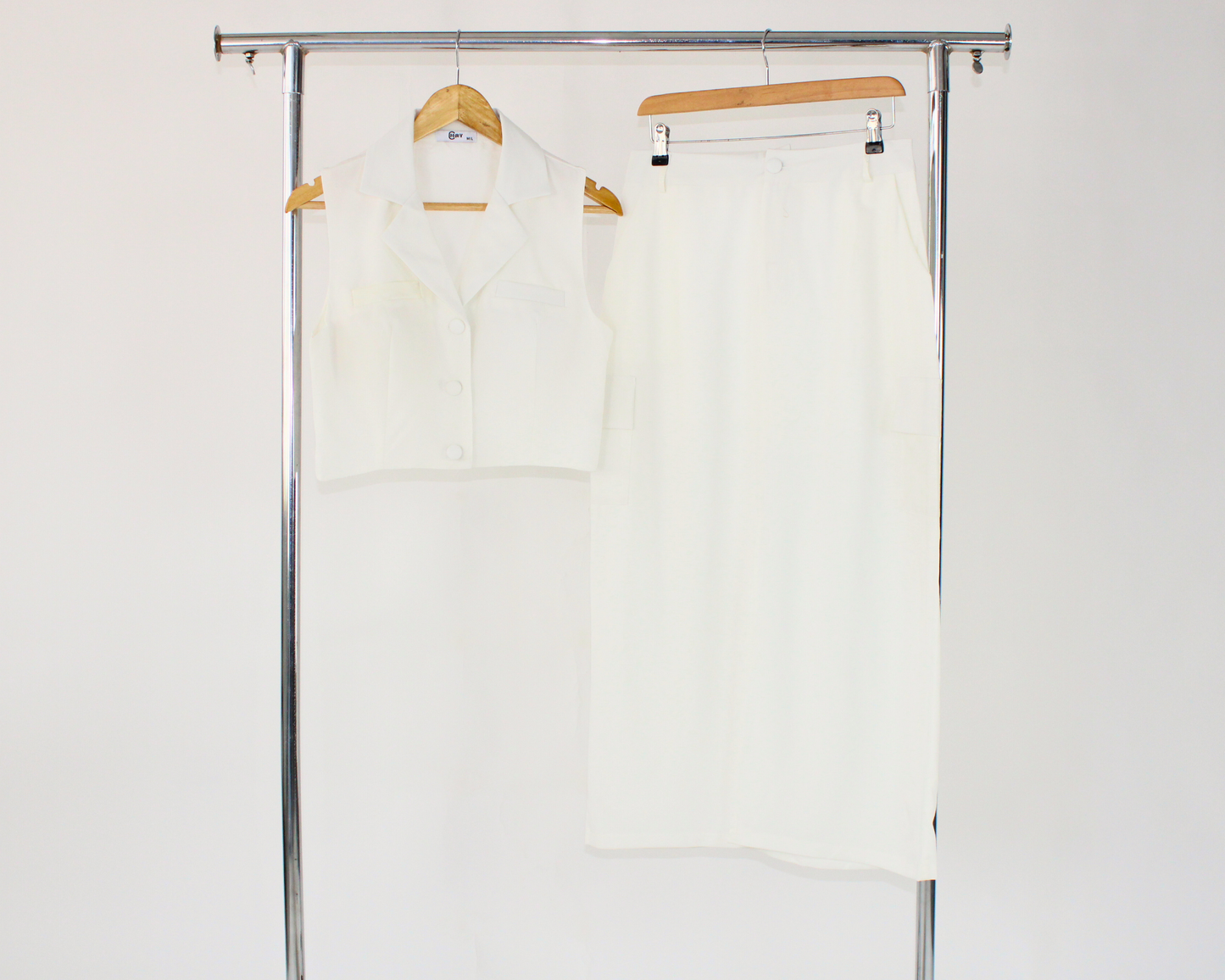 J17029 Conjunto Falda Chaleco botón aforrado