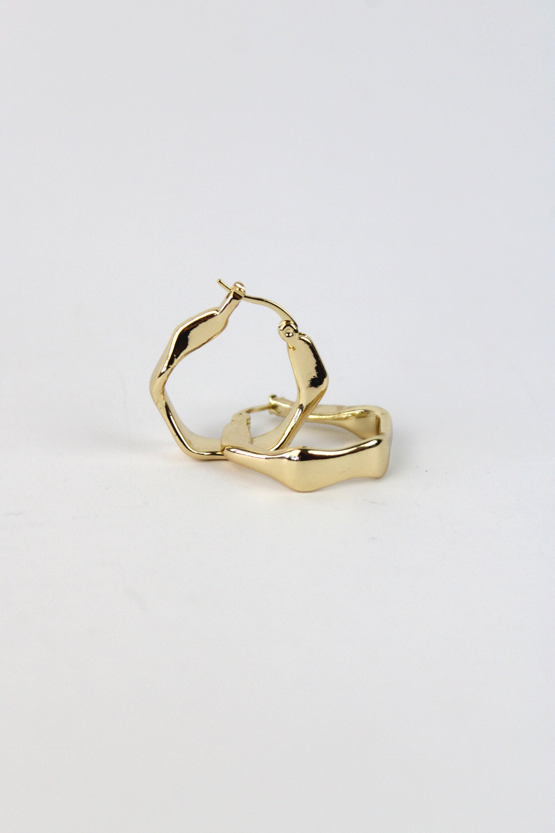 HU13018 Arracada forma irregular