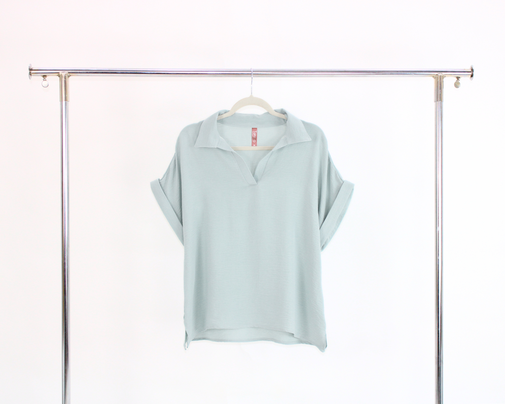 99 Blusa Color Liso Manga Doblada