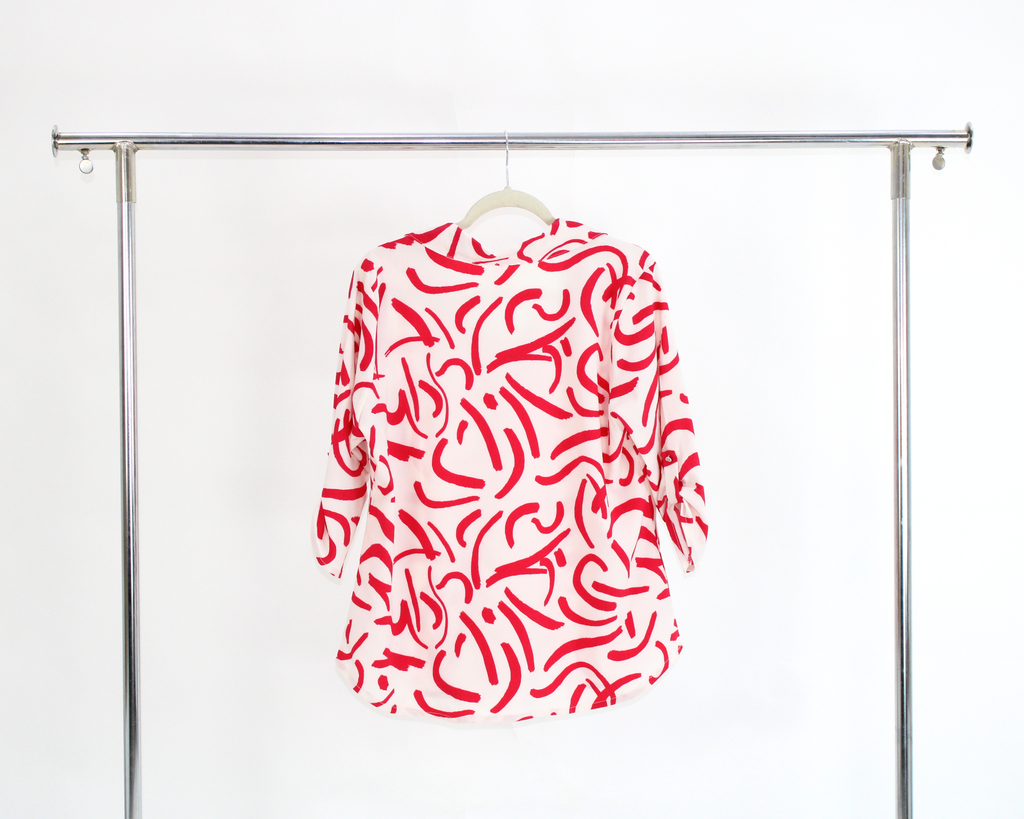 1507 Blusa Estampado líneas Cuello "V"