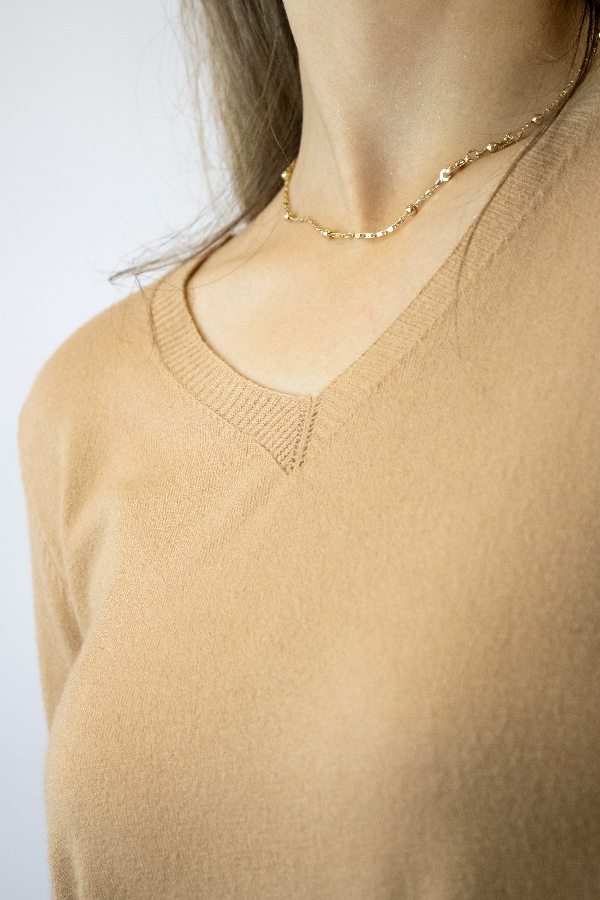23-0032 Suéter Liso Cuello V