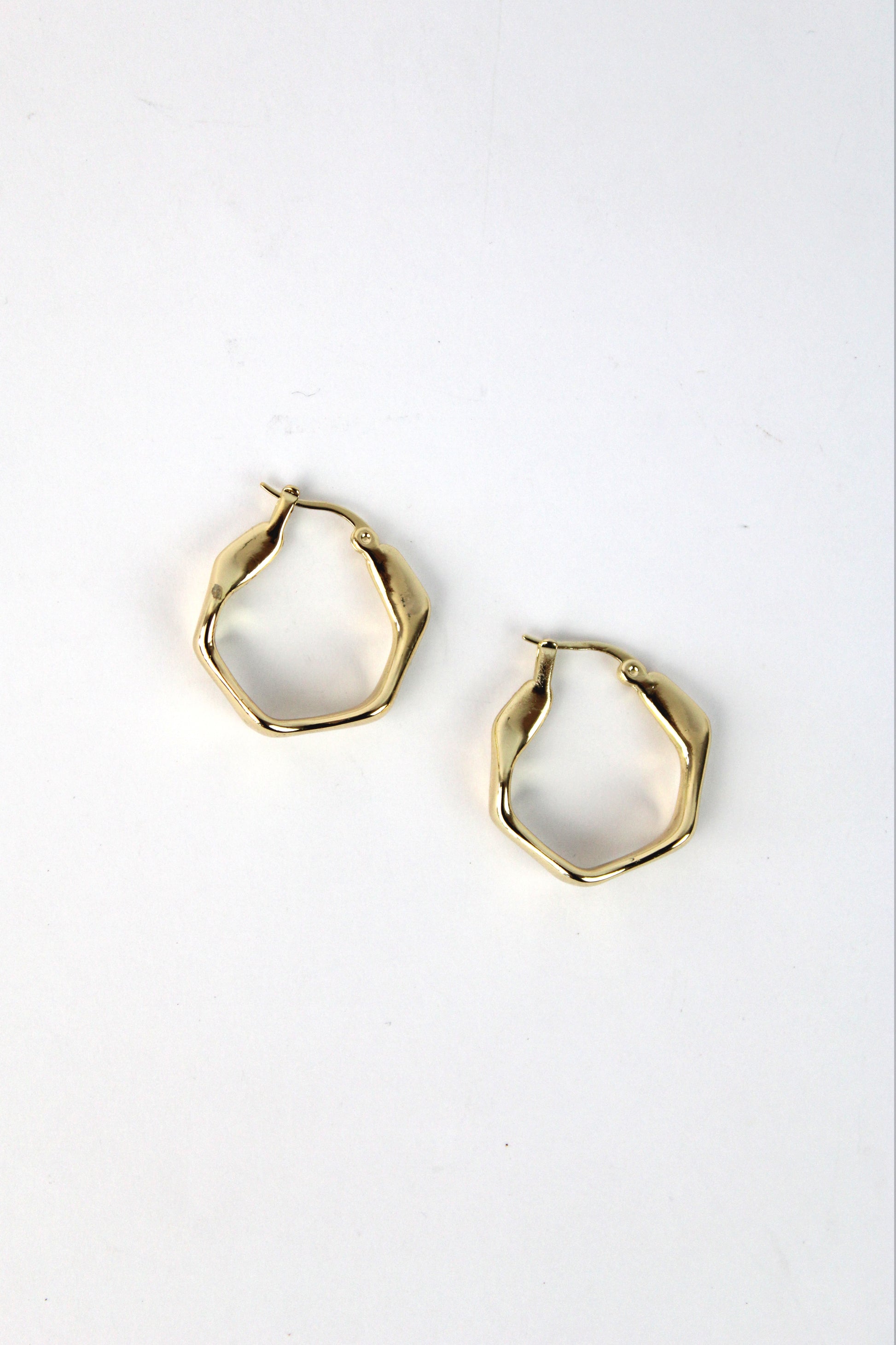 HU13018 Arracada forma irregular