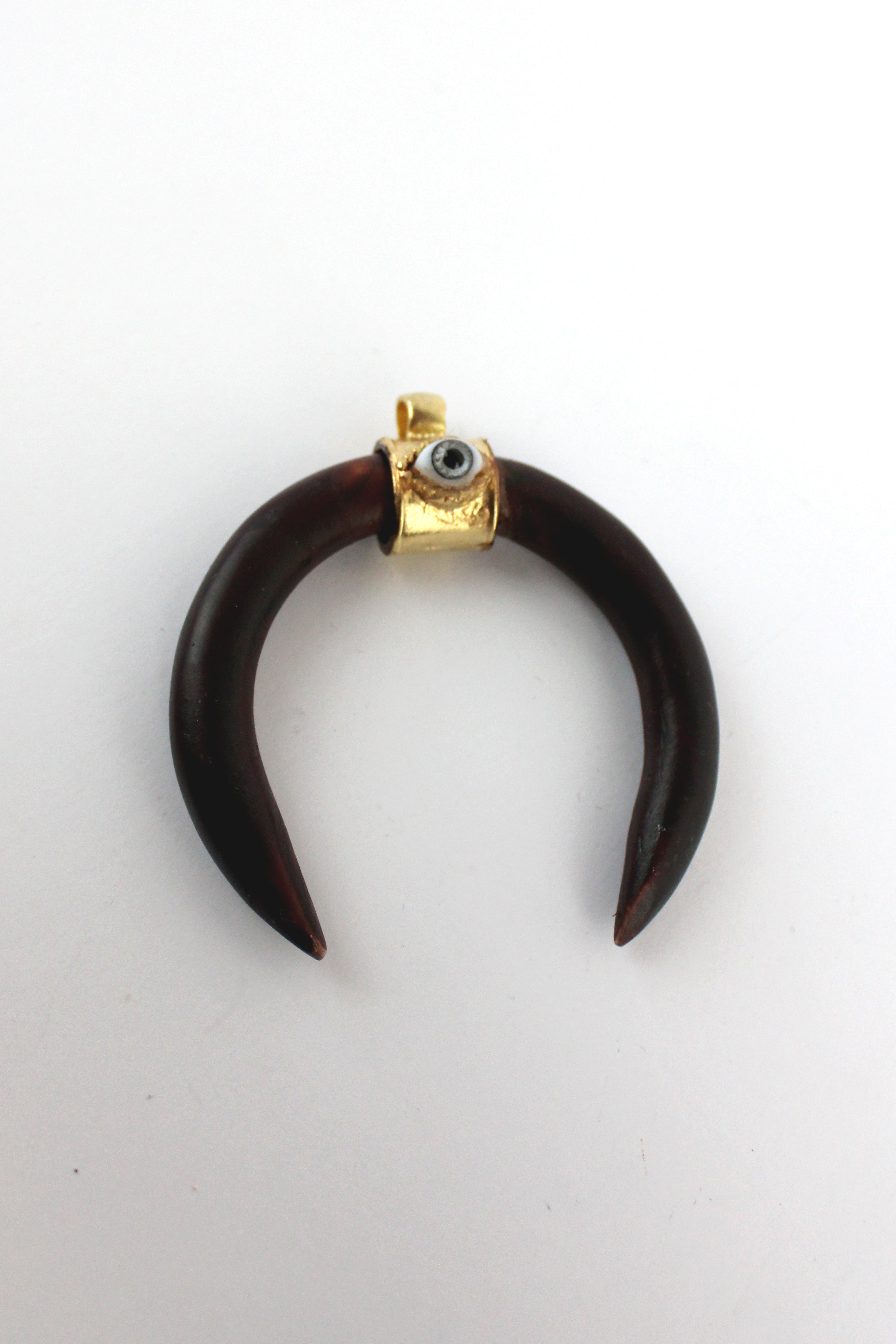 DA024 Dije medialuna con ojo