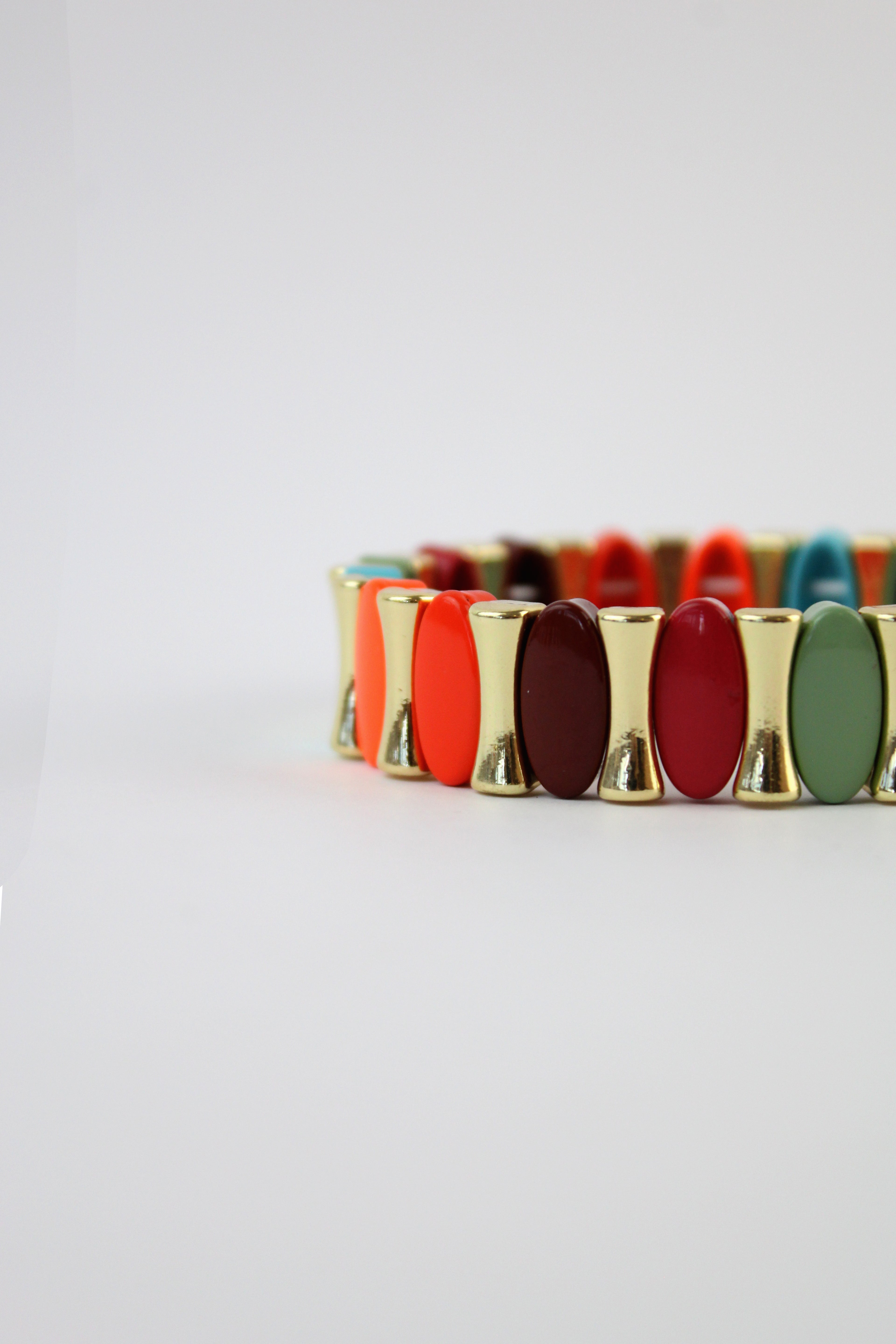 P274624 Pulsera Elastica Ovalos y Huesitos Colores