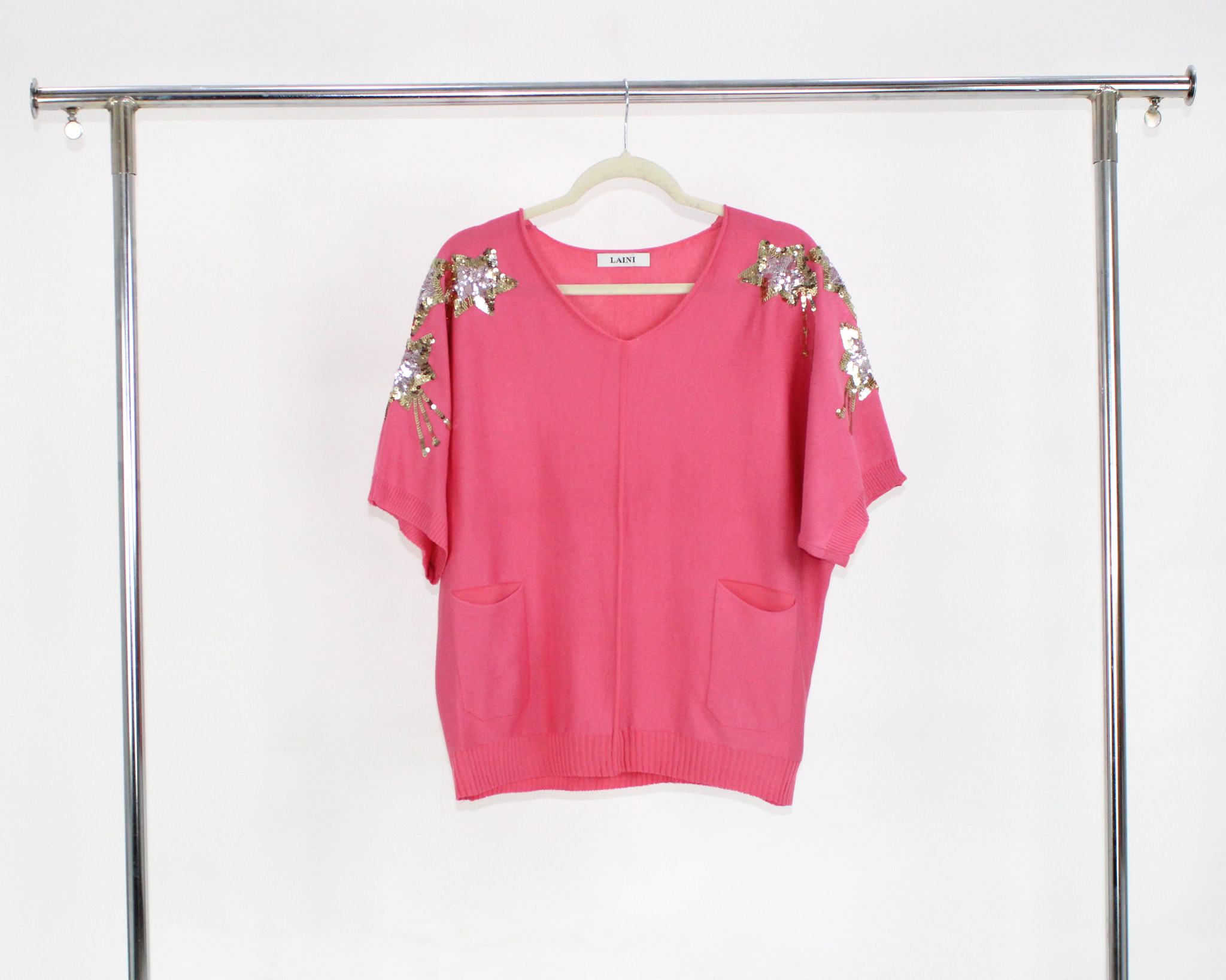 A040 Blusa Tejida Con Bolsas y Estrellas Brillosas en Hombros