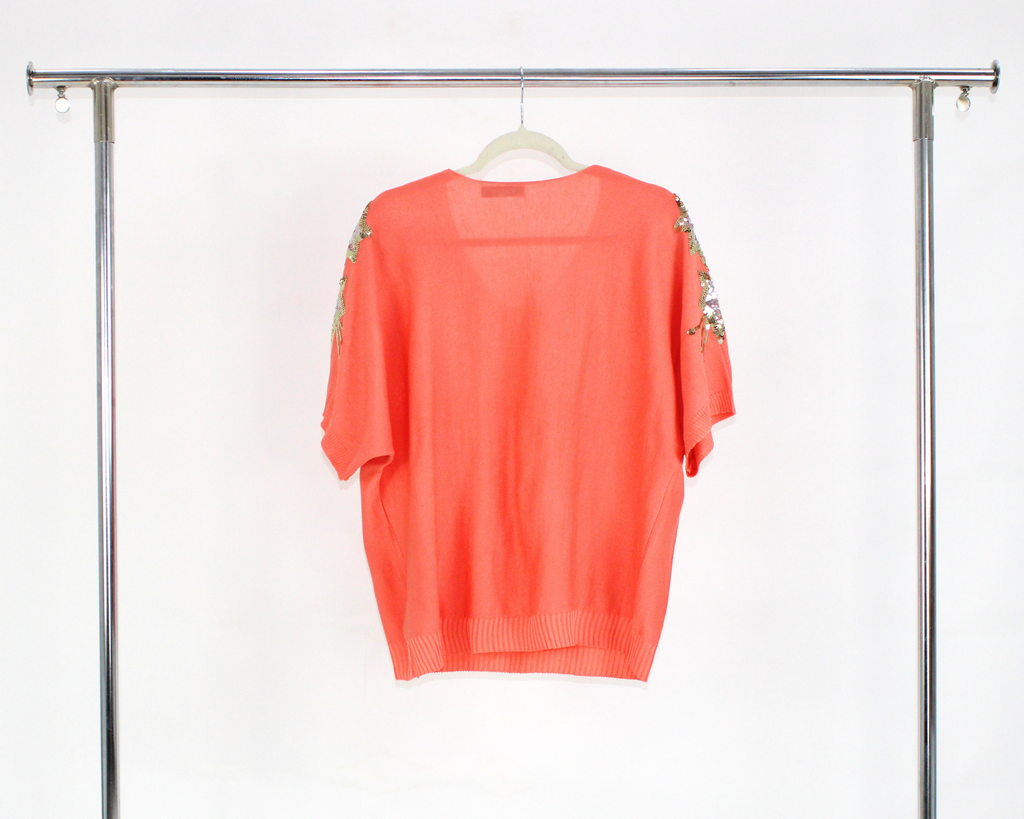 A040 Blusa Tejida Con Bolsas y Estrellas Brillosas en Hombros