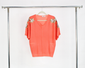 A040 Blusa Tejida Con Bolsas y Estrellas Brillosas en Hombros