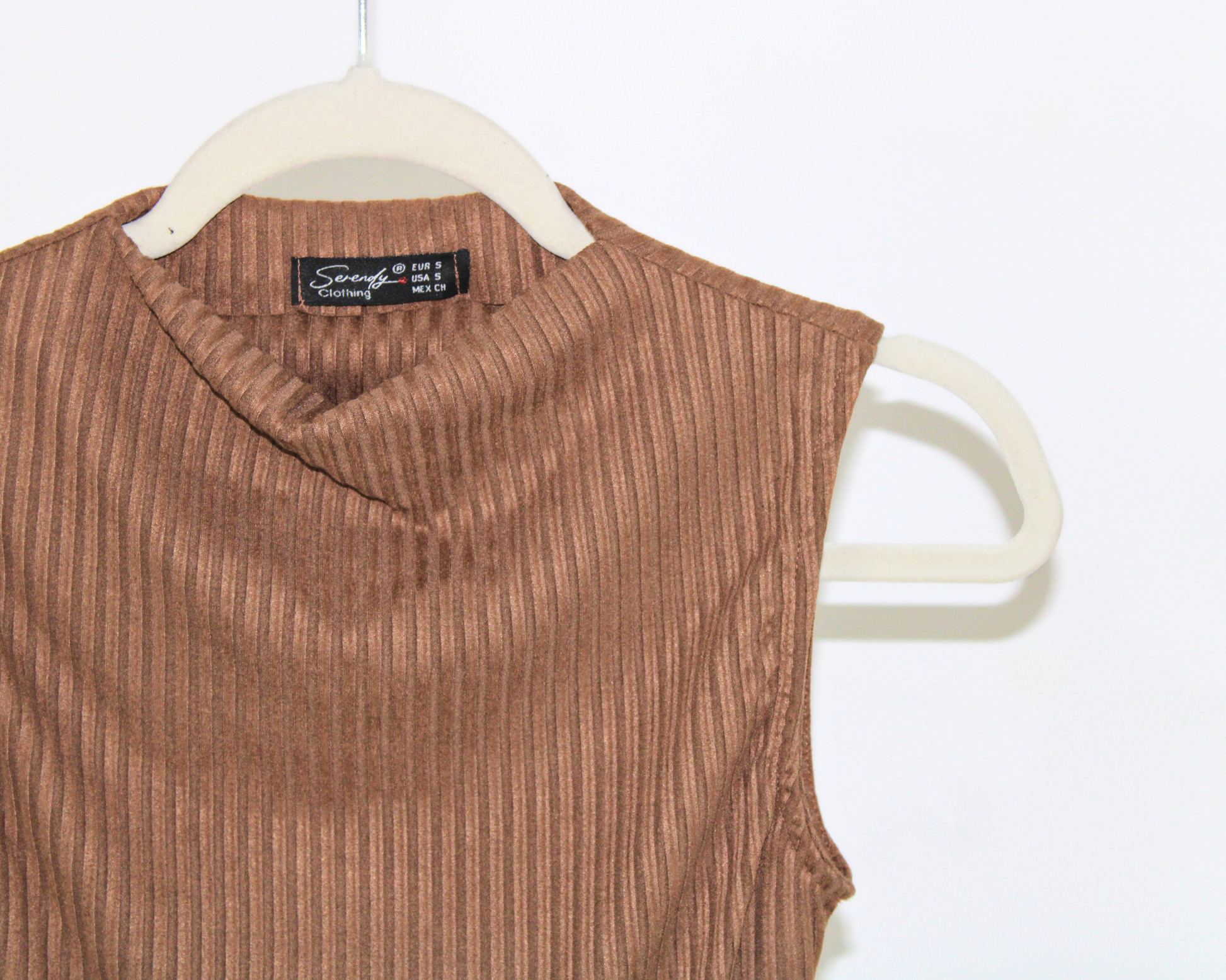 24300 Blusa sin manga rayas gamusa