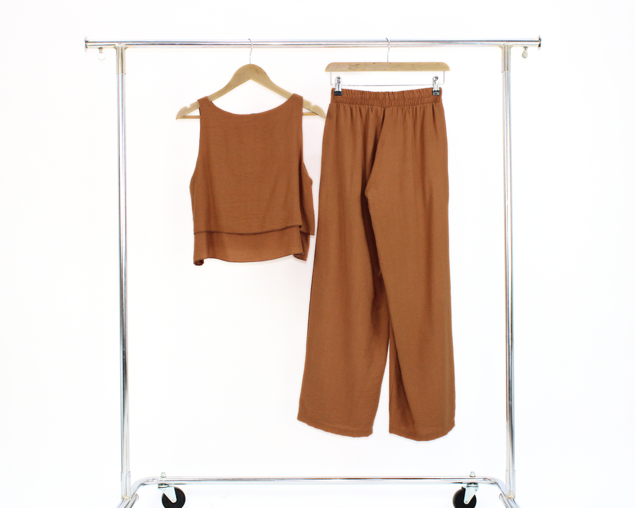 1064DLSJ Conjunto Pantalon y Blusa Doble Caida Sin Manga