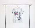 YA001 Blusa efecto roto torre, mariposa y piedras
